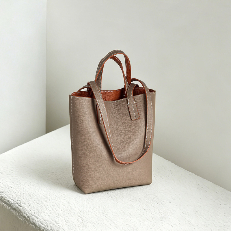 Two-Sided Two-Tone Leather Bag 2026 New Niche Design Simple Vertical Handbag with Inner Bag Single Shoulder Shopping Bag