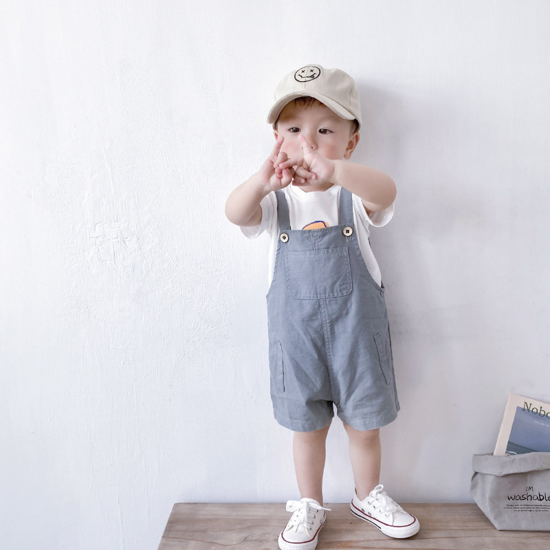 Boy baby holding baby bag pants suit Summer thin section Girl baby clothes Cute one-year-old child Super Ocean school jumpsuit
