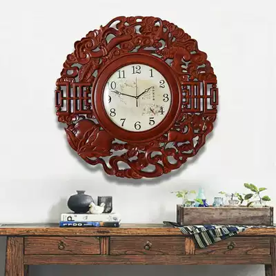 New Chinese style solid wood living room wall clock Dongyang wood carving round clock Classical atmosphere decoration clock personality quartz clock