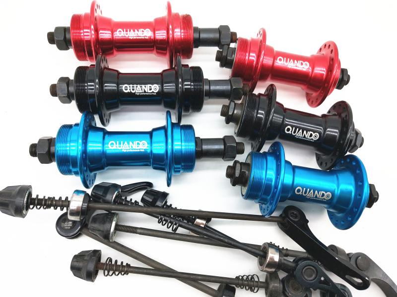 Taiwan Kunteng disc V brake aluminum alloy mountain bike quick disassembly flower 32-hole rotary double-tooth hub front and rear shaft skin