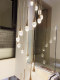 Modern Minimalist Staircase Chandelier for Duplex Villa Self-Built House, Suspended Rotating Long-Line Chandelier with a High-End Luxury Feel