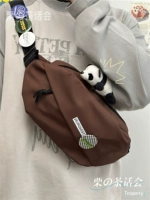 Темно -коричневая игла панда