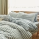 Muji Tianzhu giường bông chăn bông đan gia đình bốn Khăn bông ba siêu mềm giường doanh nghiệp khỏa thân - Bộ đồ giường bốn mảnh