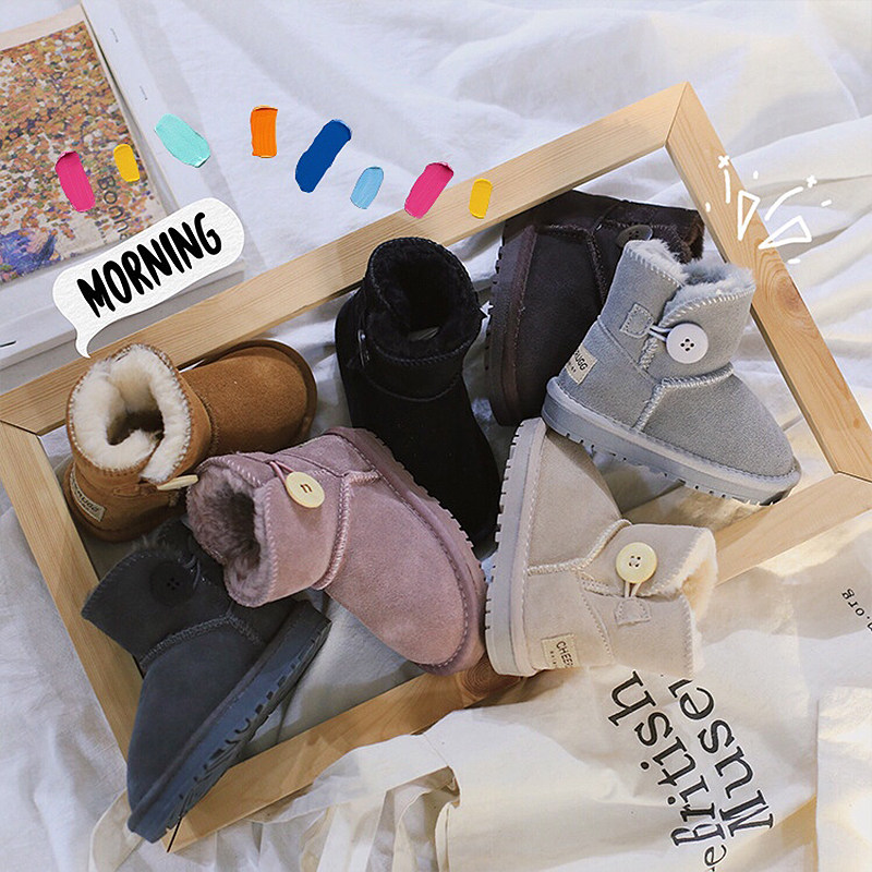 Children's snow boots fur integrated boys and girls 2023 new children's velvet thickened button baby snow boots