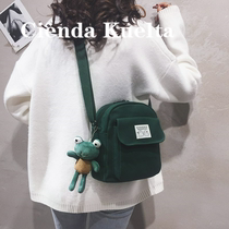 Singapore canvas small bag womens bag new 2021 Korean version of the fashion girl heart soft sister tide one-shoulder cross-body bag summer