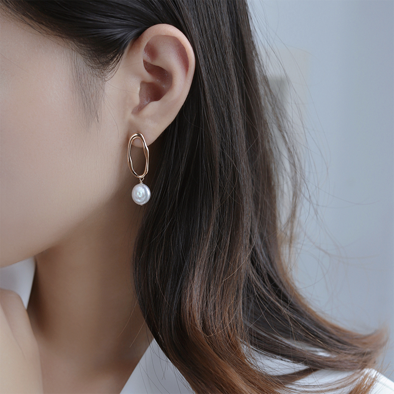 Baroque large pearl earrings high-end cold wind European and American fashion design 925 sterling silver earrings autumn and winter