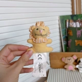 Маленькая плюшевая милая игрушка