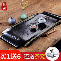Wujin Stone tea tray whole home Natural Stone Tea Sea simple black gold stone tea table rectangular large trumpet