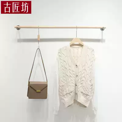 Clothing store display rack on the wall hanging clothes women's clothing store shelves are hanging stainless steel clothes shelves Nordic Korean version