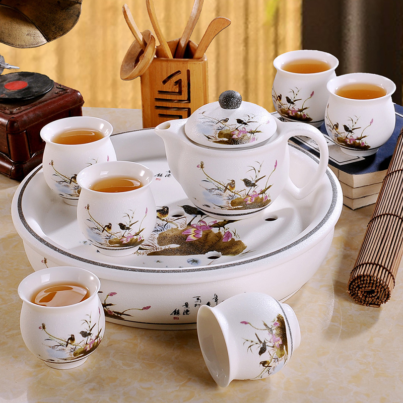 The Was suit household modern jingdezhen ceramic kung fu tea cups contracted circular teapot tea tray package