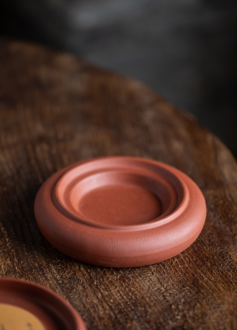 Yixing it bearing Chinese style household kung fu tea tea accessories checking out creative teapots mat base collet