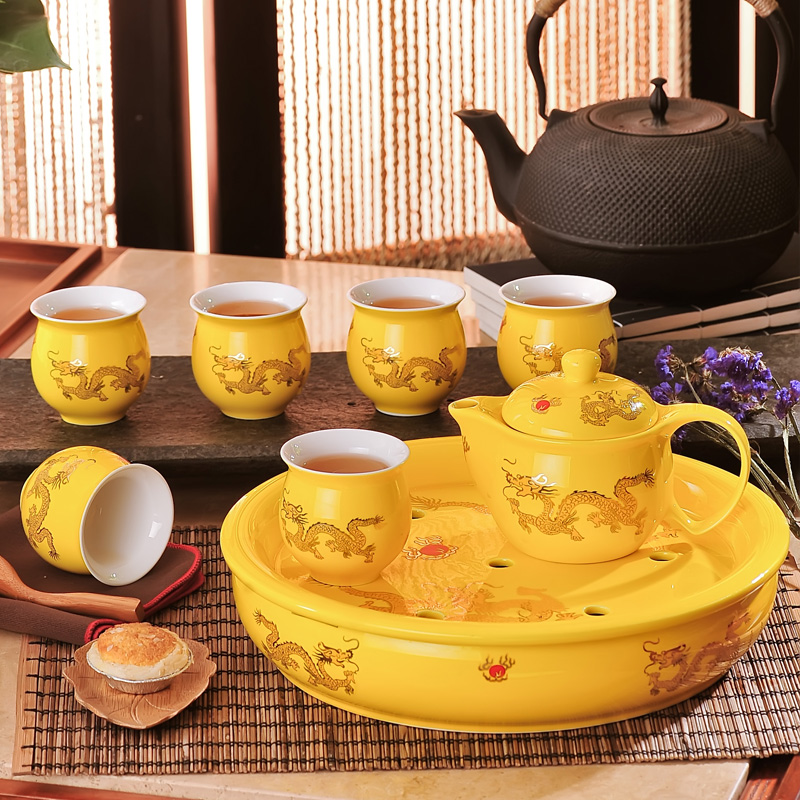 Jingdezhen ceramic tea set suit household of Chinese style kung fu tea taking round a cup of tea with tea tray cups of a complete set of the teapot