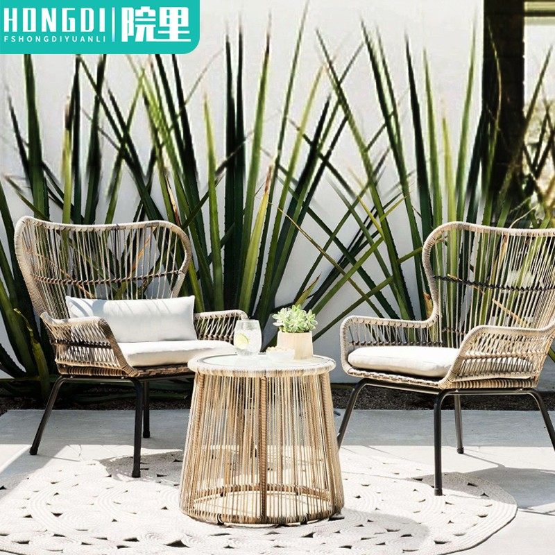 Outdoor small table and chair net red rattan chair three-piece combination creative balcony coffee table chair rattan leisure table and chair combination