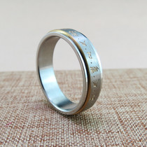 The knot yellow Wealth God heart curse ring male Lady transfer ring titanium steel can rotate Buddha curse couple amulet