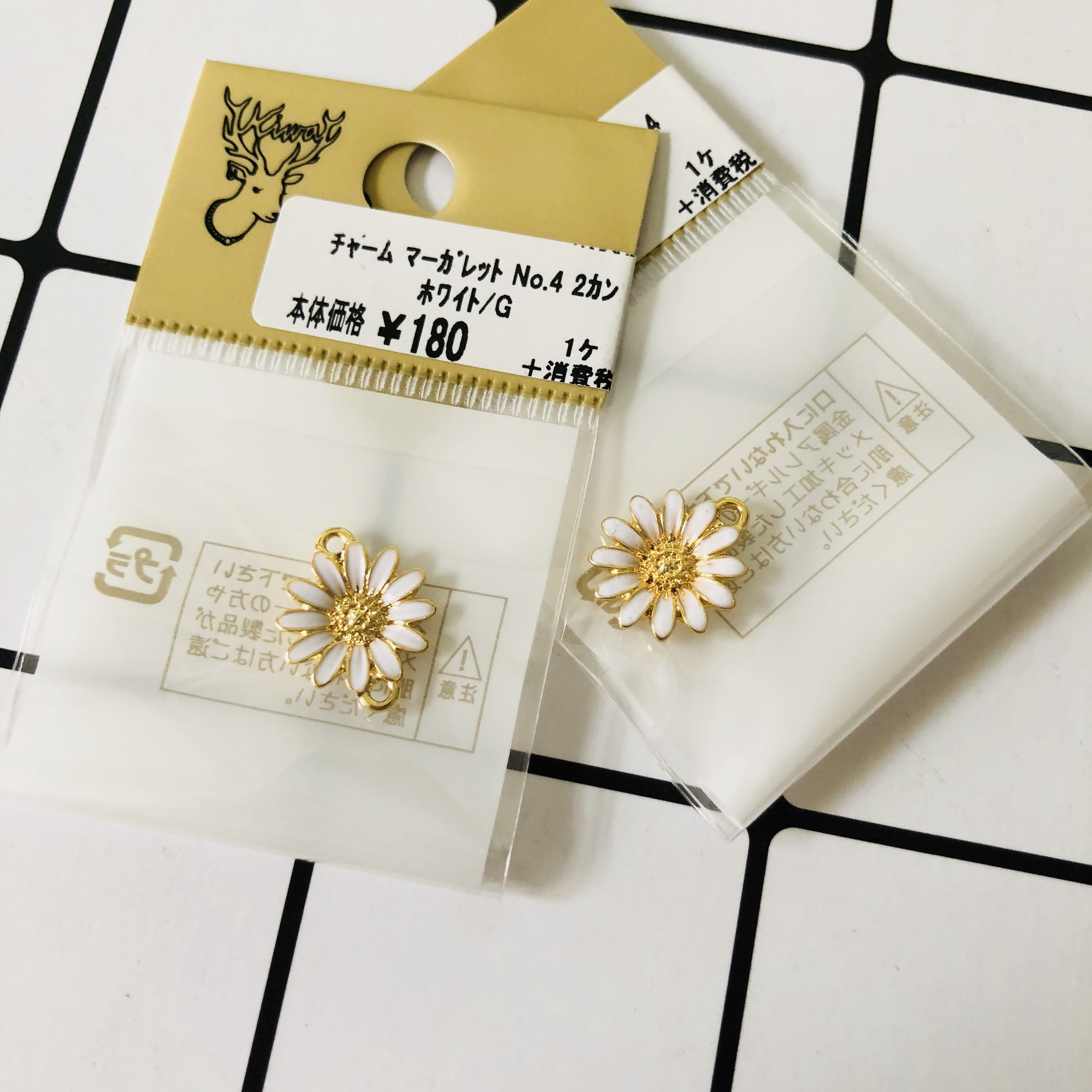 Shunfeng Spot Japan kiwa expensive and manufacturing all white sunflower spring new earrings diy accessories