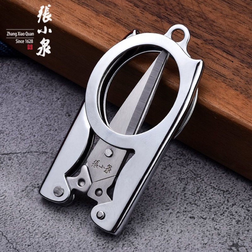 Zhang Xiaoquan Stainless steel folding scissors Travel scissors Nail scissors Fishing scissors Home daily light riding portable belt