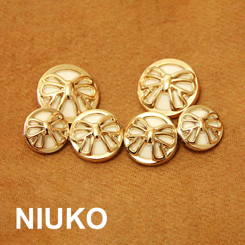 NIUKO clothing accessories butterfly knots gold white resin plastic buttons Dizi DIY buttons for large clothing accessories specialties