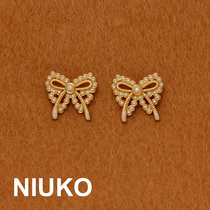 NIUKO new delicate golden butterfly knot decoration button imitation pearl upscale accessories girl wind metal button