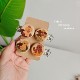 Cross stitch ໄມ້ເຂັມດູດແລະປ່ອຍໂທລະສັບມືຖື bezel round wood cloth buckle clip cute side clip pull cloth embroidery stretch wood solid