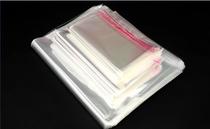 OPP self-adhesive bag packaging bag garment bag extra thick 12 wires flower knife with holes 35*44CM