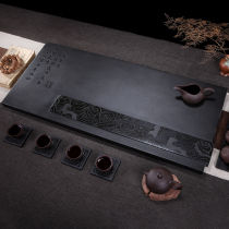 Original black gold stone tea tray natural whole large stone drainage stone Black gold stone tea table household modern living room