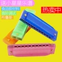 Damei Tiancheng Children Harmonica 10 lỗ chơi cho bé mới bắt đầu nhạc cụ Phim hoạt hình Giáng sinh món quà đồ chơi - Nhạc cụ phương Tây trống lắc