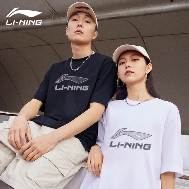 Li Ning ເສື້ອທີເຊີດແຂນສັ້ນຂອງຜູ້ຊາຍ 2024 ກິລາລະດູຮ້ອນໃຫມ່ ເສື້ອທີເຊີດຝ້າຍບໍລິສຸດຂອງແມ່ຍິງກາງແຂນວ່າງຂອງຄູ່ຮັກຍີ່ຫໍ້ trendy ແຫ້ງໄວ