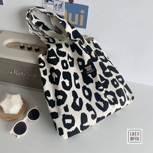 Оригинальная домашняя пригородная корова схема повседневная 𫔮 Большой настройка тотации Canvas College Книга Универсальная литературная женская сумка с однорубежной литературной однорубежной