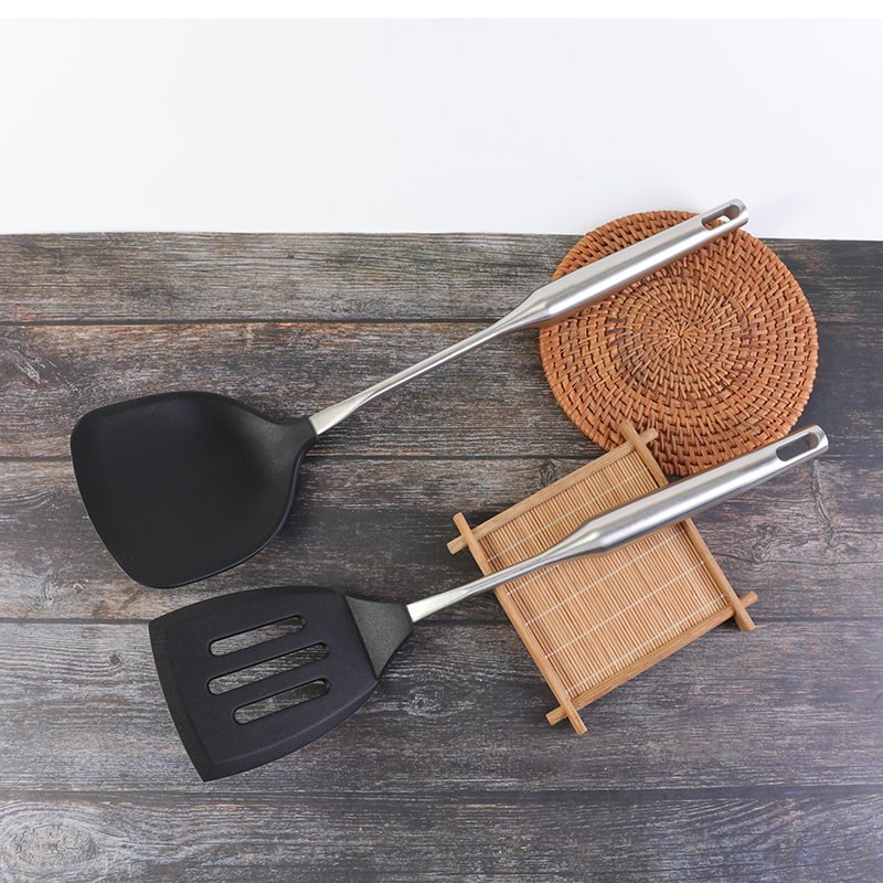 Foreign trade tail goods No magnetic austenitic stainless steel solid handle integrated cookware food-grade silicone pan shovel leakage shovel