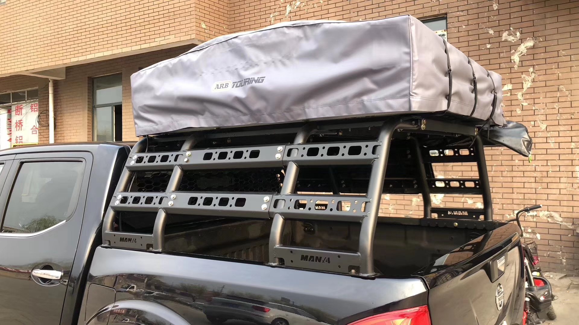 Applicable to the Fifty - Suzzle DMAX Remai modified dragon door can be extended to extend the roll - off frame Marn