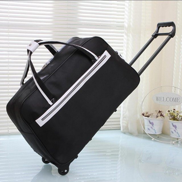 Korean version of the little monster male and female trolley bag travel portable travel bag boarding case large capacity bag luggage bag