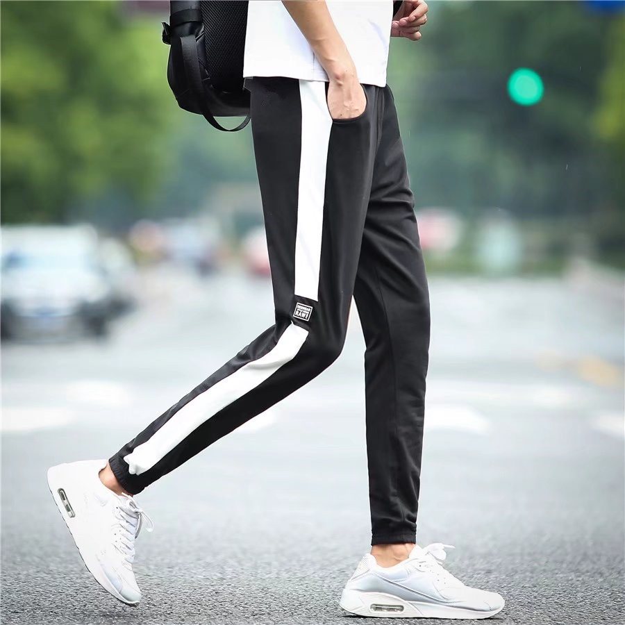 Sinh viên quần âu quần thể thao nam mùa xuân và mùa thu Slim Phiên bản Hàn Quốc của xu hướng quần chân thủy triều quần rộng giản dị quần jean nam đẹp