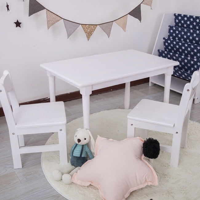 white wooden childrens table and chairs