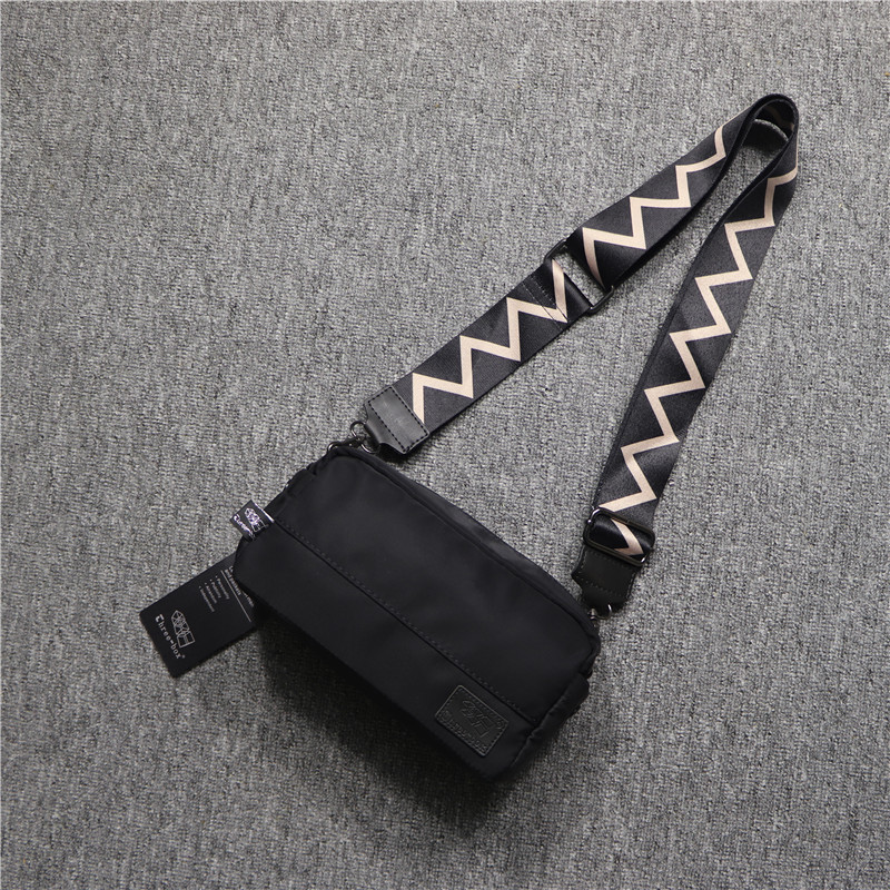 Three-box Korean version of Japanese Oxford cloth men's shoulder bag casual trend oblique cross men and women striped ribbon small backpack