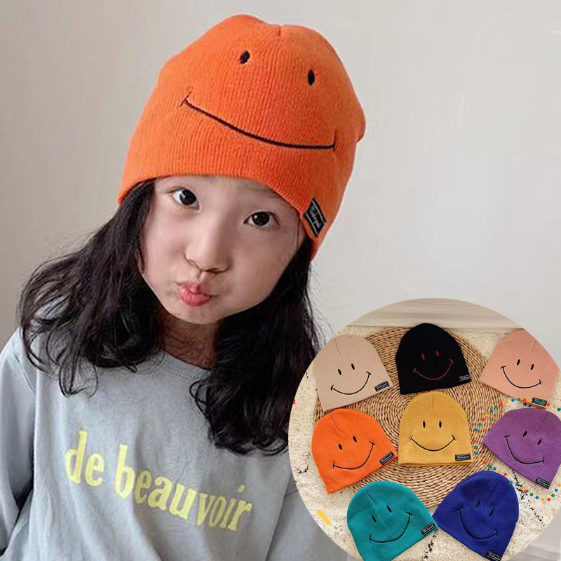 Children's front and rear expressions autumn and winter new style embroidery smiley children's knitted hat Korean version of baby pullover wool