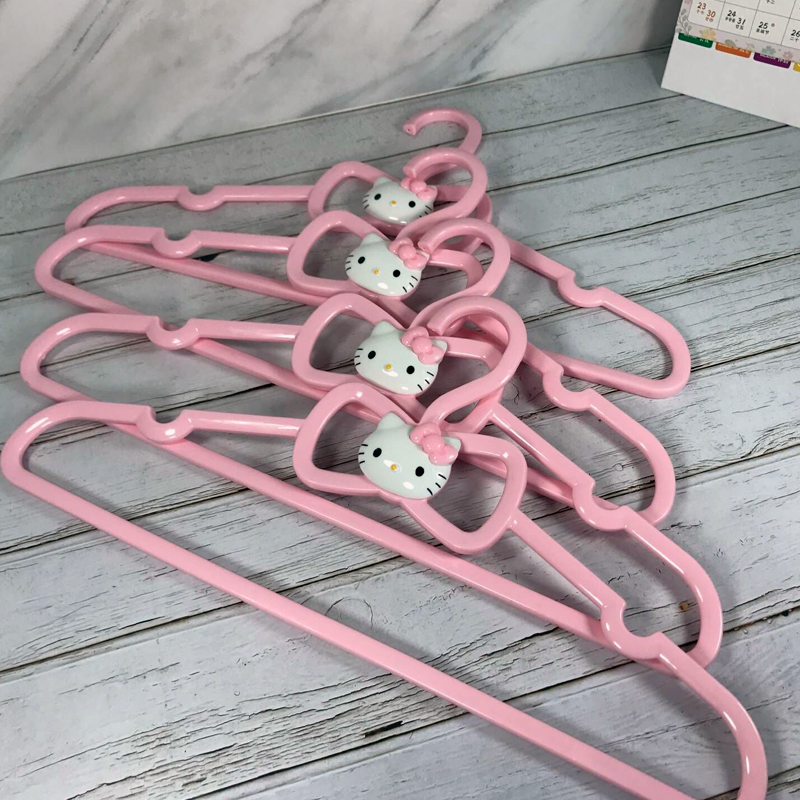 Cute plastic clothes Cartoon students Cartoon students Hanging clothes for household wardrobe shelves for adult skid - proof sun - skid rack