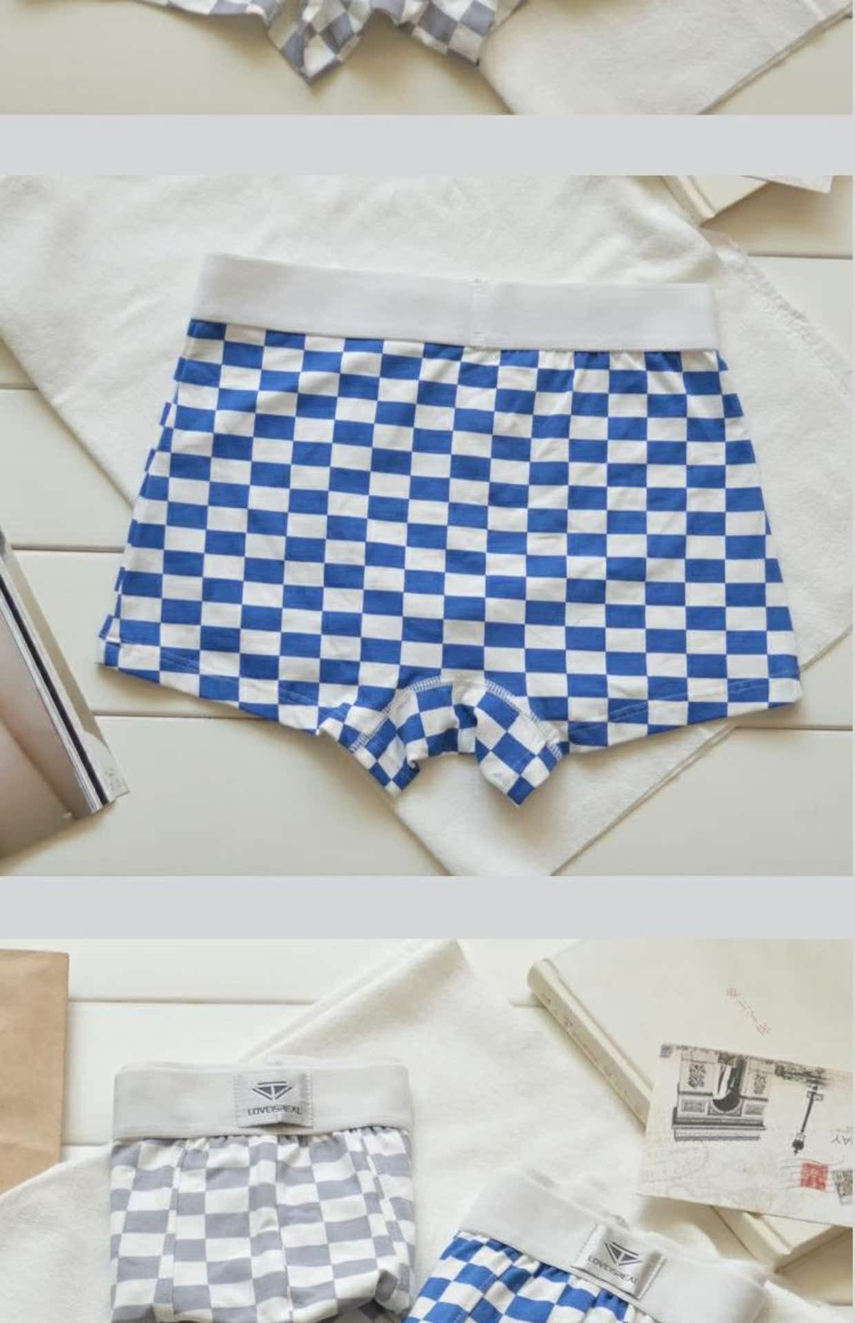 Cặp đôi thời trang ca rô đồ lót thủy triều thể thao nam và nữ võ sĩ vải cotton nguyên chất thanh niên eo thoải mái quần lót dệt kim