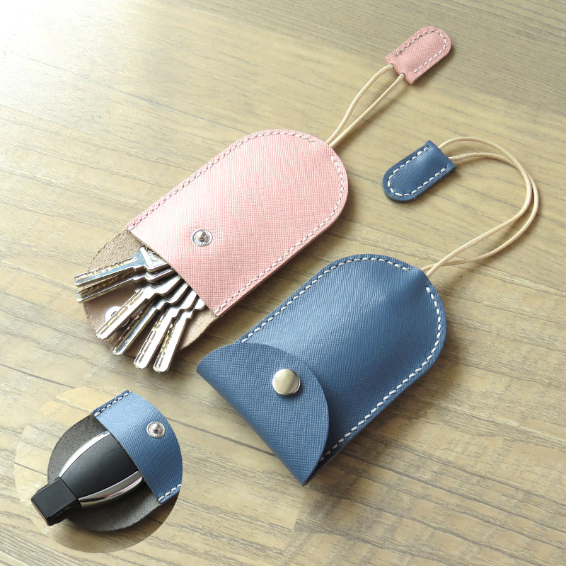 Handmade leather key bag men's and women's cowhide family car universal pull-out multi-function key bag bag