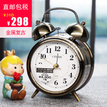 Japanese RHYTHM Riseng bedroom bedside retro double bell night light student mute Golden alarm clock
