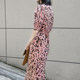 ສີບົວ French retro leopard print temperament dress women's puff sleeve slit floral skirt summer waist slimming long skirt