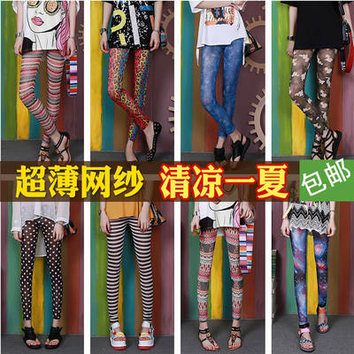 The thin, high-elasticity, tight-fitting, slimming and personalized nine-inch pants with colorful prints for women's outerwear in summer are trendy