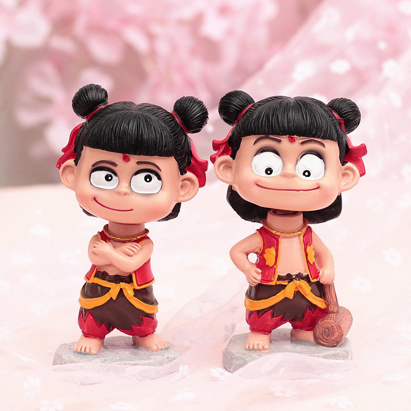 Net red with the same Nezha devil boy model around Ao Bing car ornaments creative car shaking head doll toys