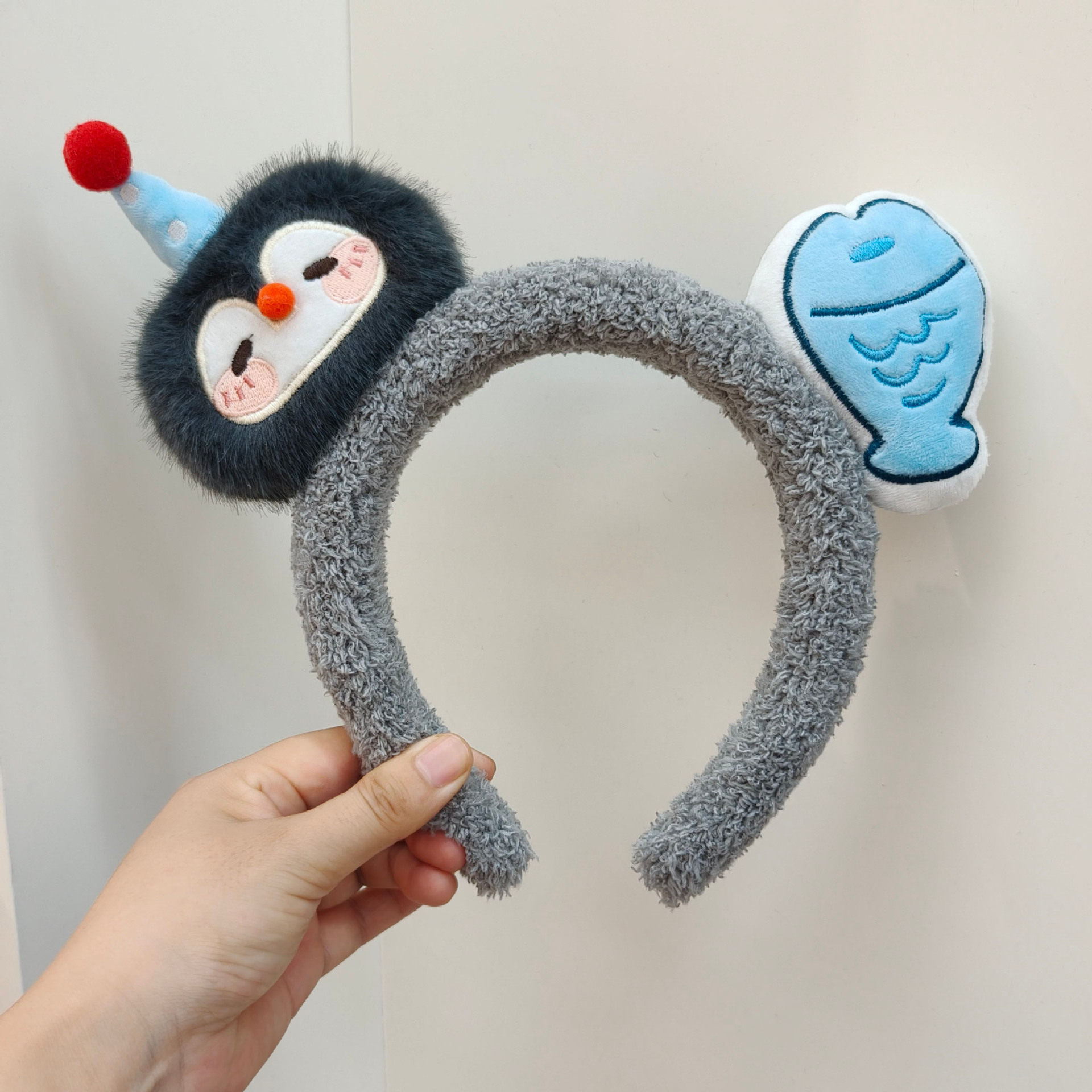 硬核实测！韩系企鹅小鱼发箍：萌趣外表下藏着“铁憨憨”实力？_假发发箍_淘宝美妆网