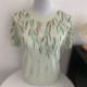 ຜູ້ຍິງໄວກາງອາຍຸກາງແຂນ ice silk silk short-sleeved summer T-shirt mom's knitted sweater thin middle-aged loose large size top