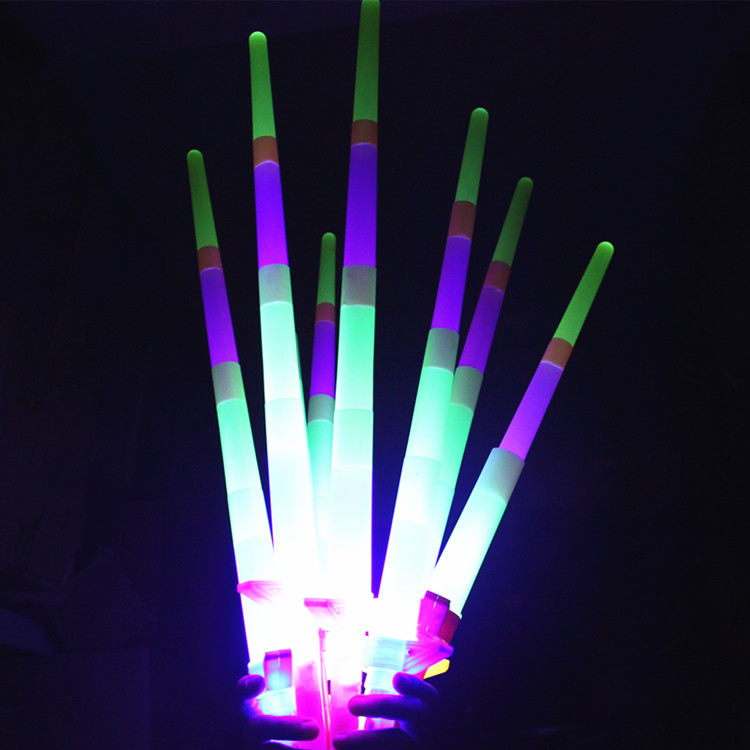 Glowing small toy stick boy Yiwu children's toy night market square push scan code stall supply boy gift