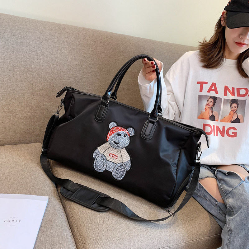 Cartoon travel bag large capacity light cute Korean short distance net red luggage bag women hand travel travel bag tide