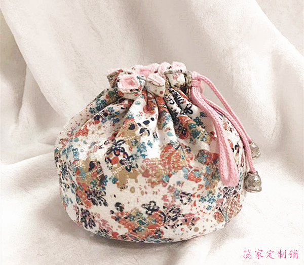 Rui handmade soup woman cloth set cotton white floral hand stove storage bag electric cake set recommended custom empty bag