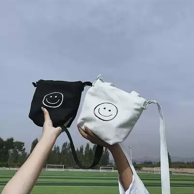 Children's canvas tote bag Japanese and Korean smiley face letter children shoulder bag boy and girl baby crossbody bag tide