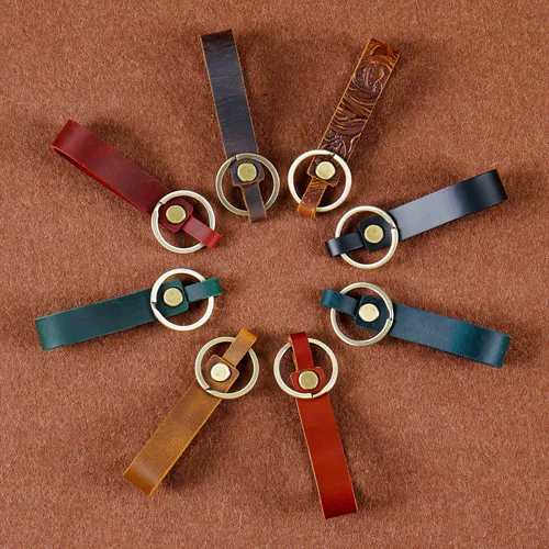 Audi, кожаный брелок подходит для мужчин и женщин, высококлассная креативная подвеска для ключей с застежкой, воловья кожа, из натуральной кожи, простой и элегантный дизайн, креативный подарок