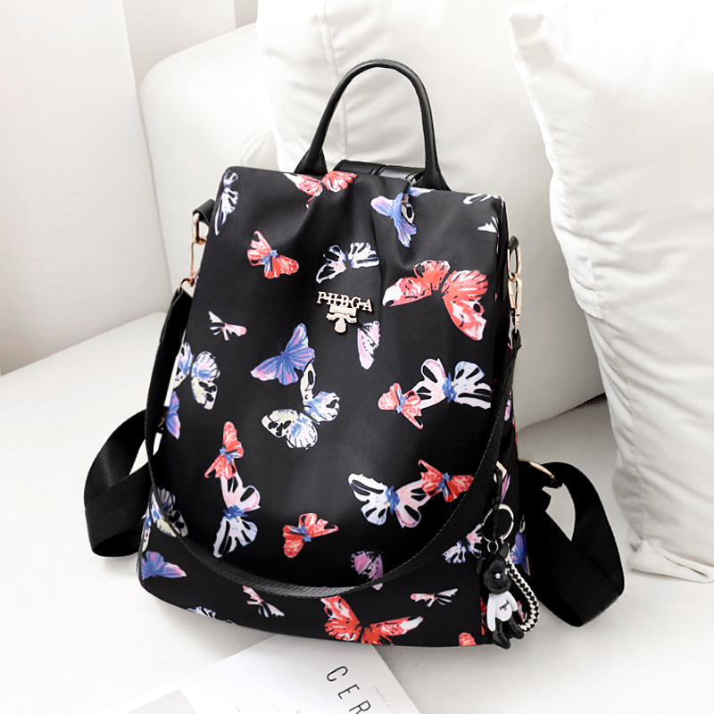 Oxford cloth shoulder bag female 2021 new fashion Korean version of the fashion printing canvas travel small backpack female anti-theft school bag